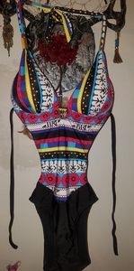 1 piece swimsuit with sides cut out